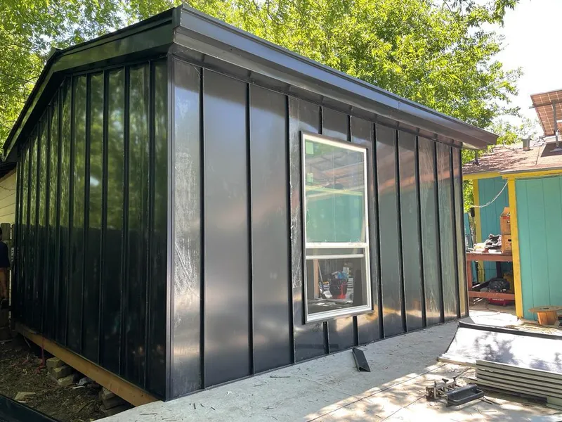 Black standing seam metal wall panels for Metal Roof Installation in Halifax