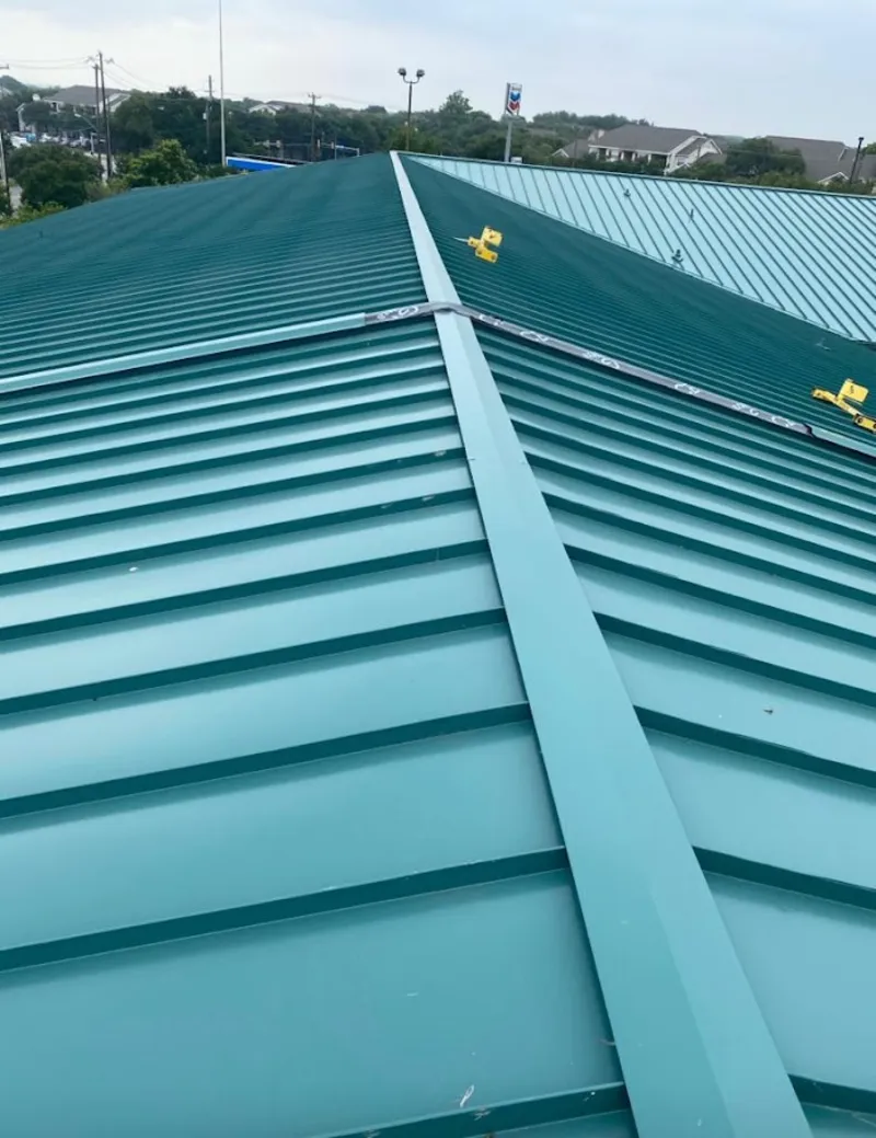 Green commercial metal roof ridge and valley for Metal Roof Repair in Halifax